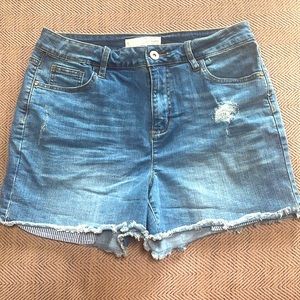 Lightly distressed, peek a boo pocket denim shorts